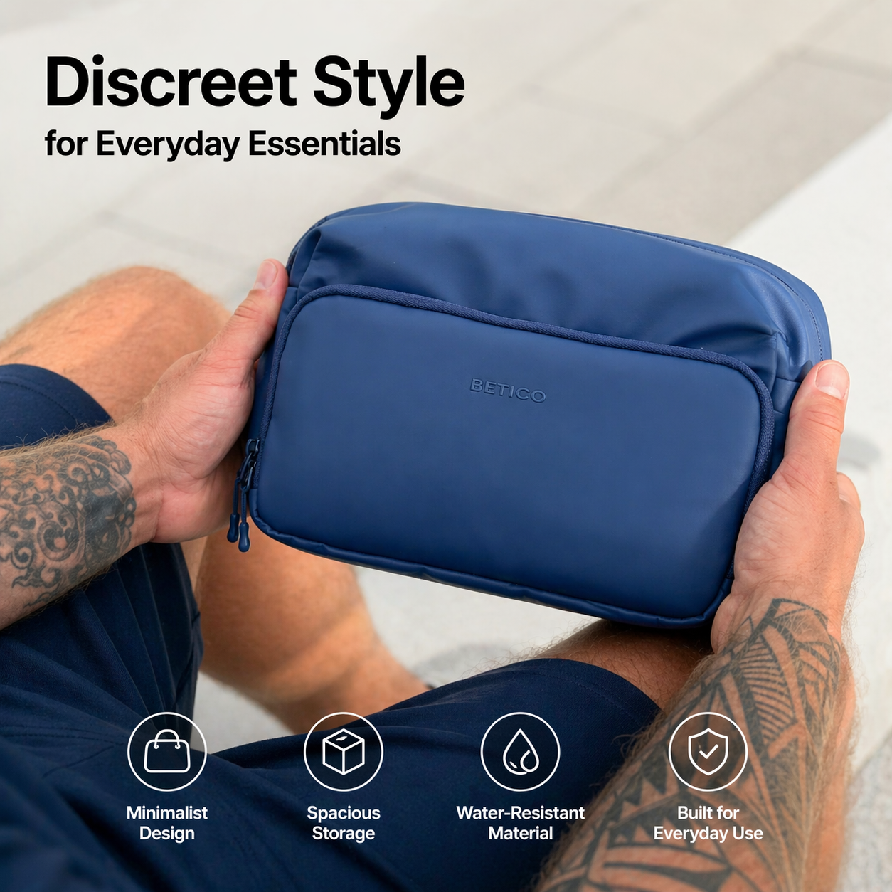 Man holding blue Betico Essential Bag designed for discreet everyday organisation and hands-free convenience