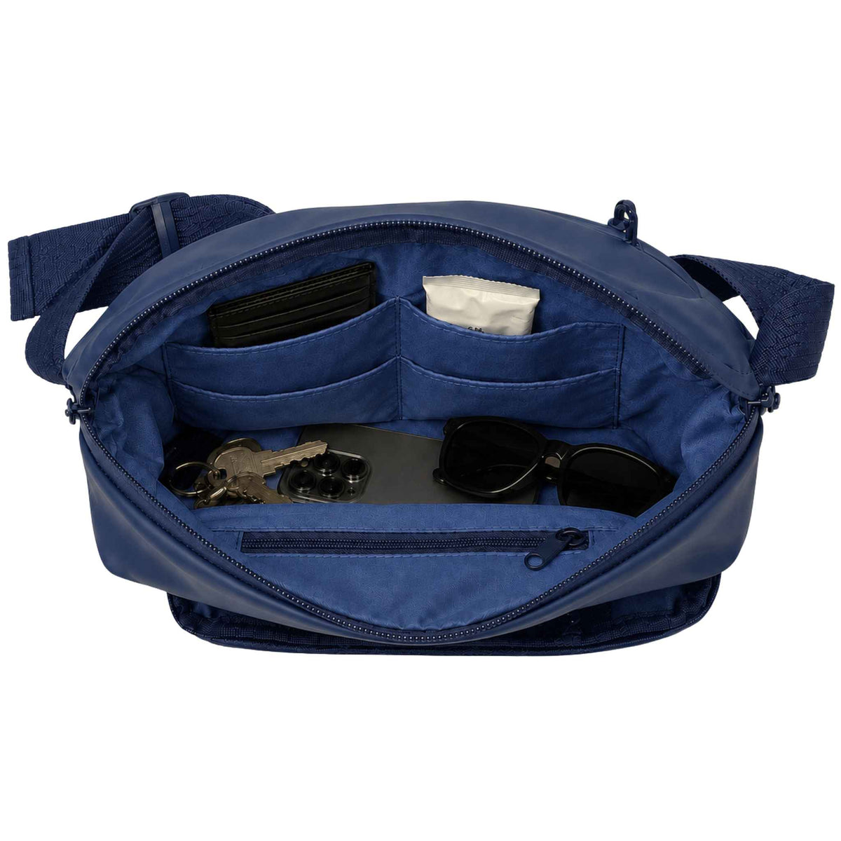 Blue Betico Essential Diabetes Bag with the main compartment open, showing four slip pockets, an internal zip pocket, phone, keys, wallet and sunglasses.